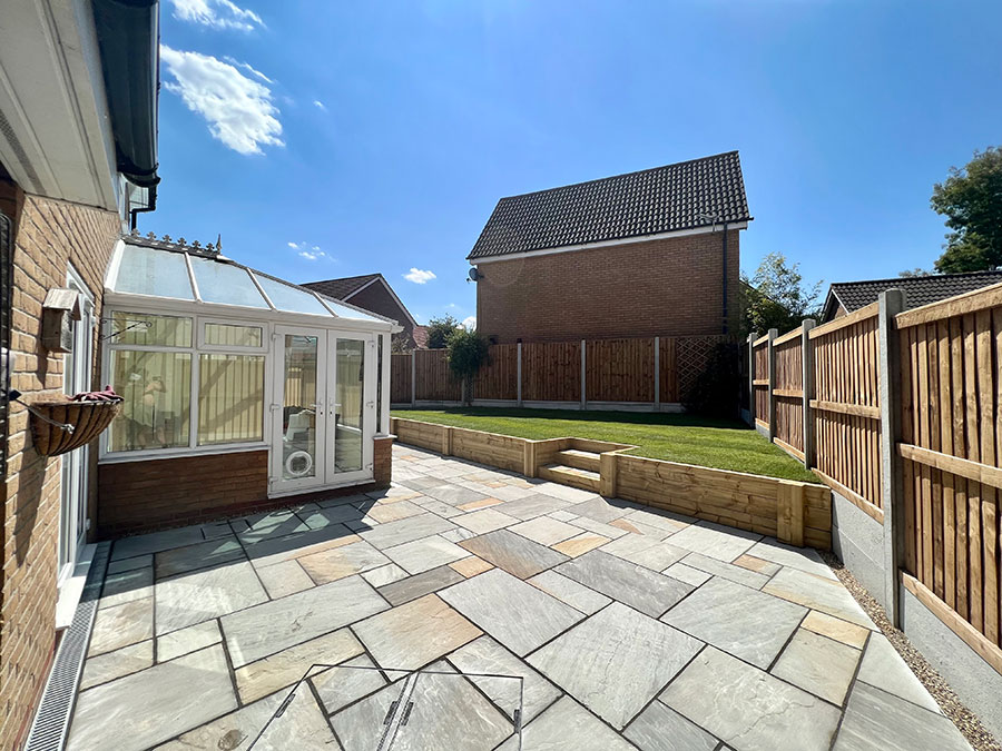 Large Sandstone Patio, Sleep Walls and New Turf